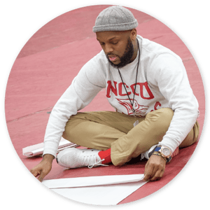NCCU | Eagle Promise Realized: Male NCCU student working on a project